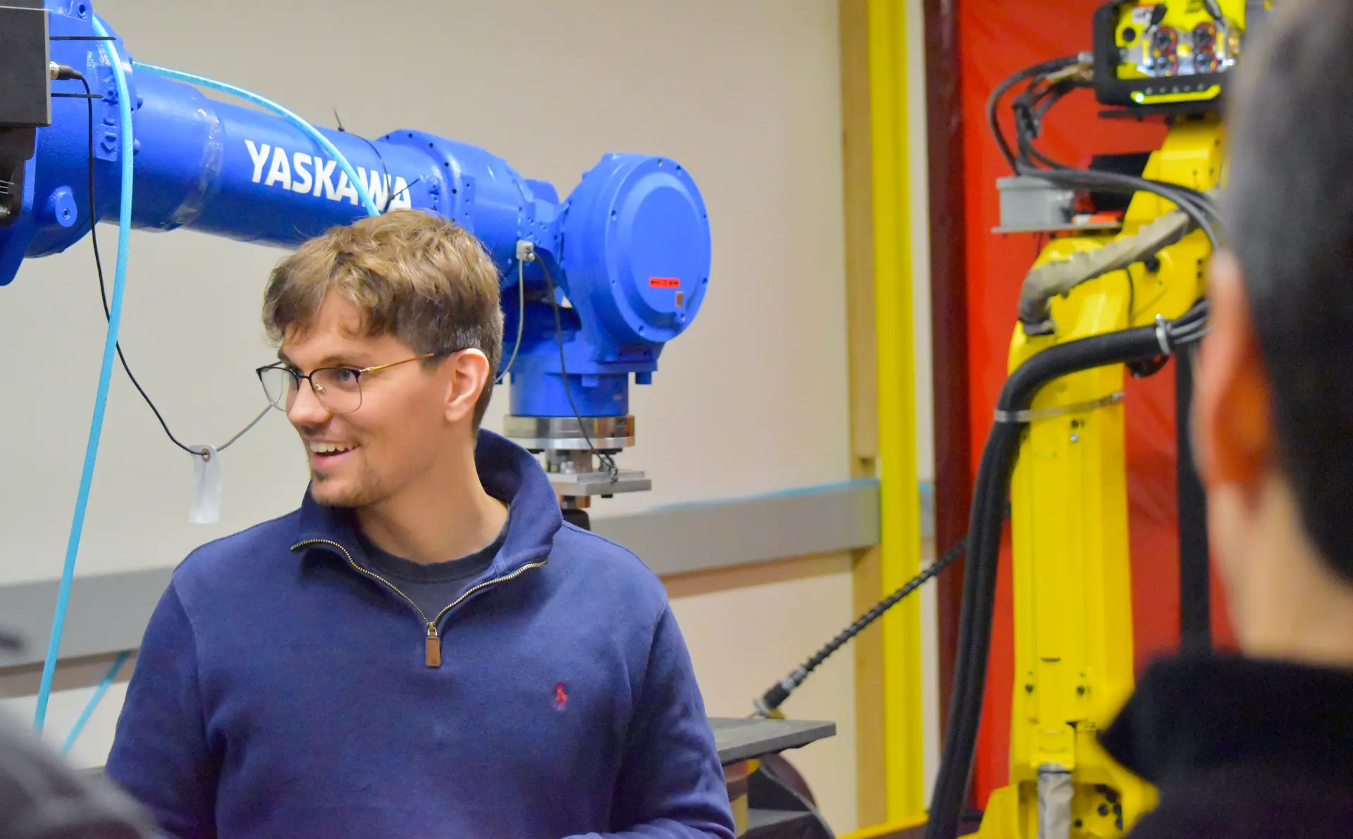 Mechanical engineer in robotics with a Yaskawa Motoman Robot and a Fanuc welding robot